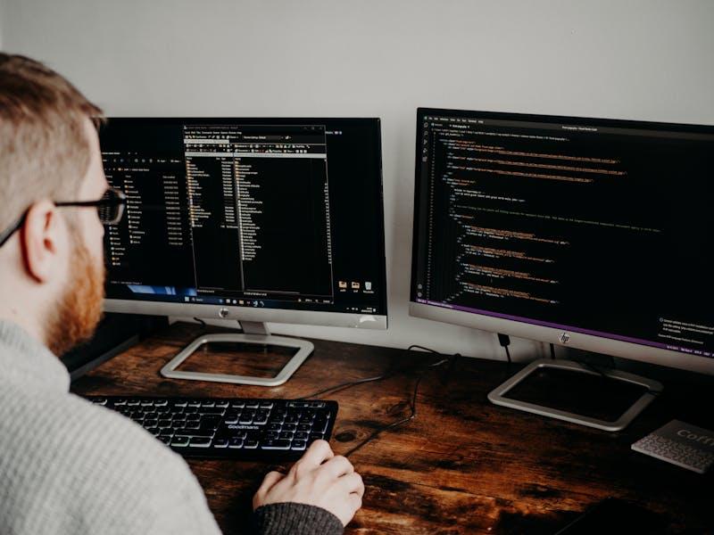 Man coding a landing page